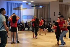 People dancing together in a dance studio