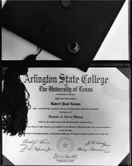 A graduation diploma certificate with a cap and ring