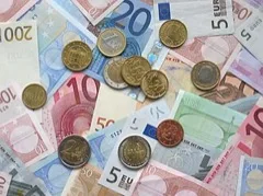 Euro banknotes and coins of different denominations